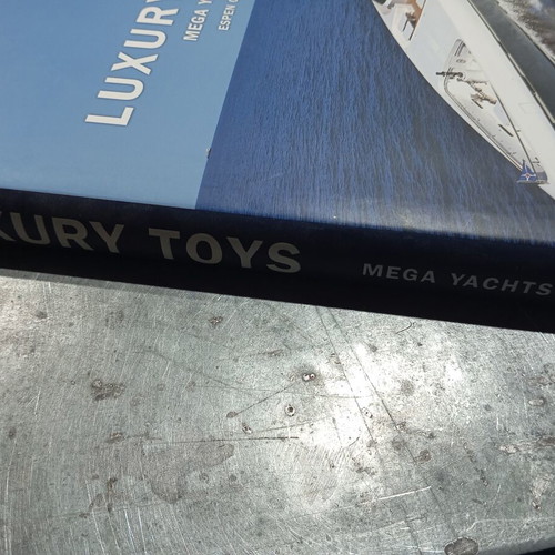 Luxury Toys Mega Yachts by Espen Oeino like new