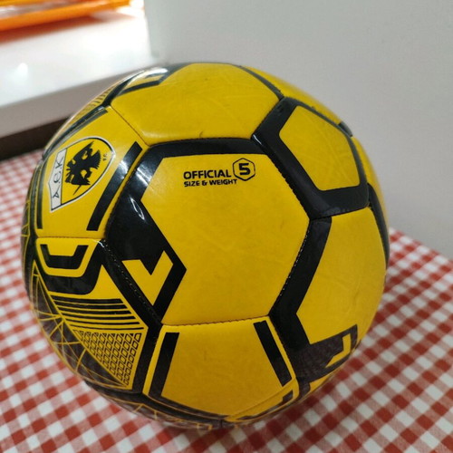 AEK Striker soccer ball like new, yellow-black, size 5