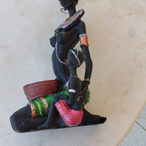African statue of mother and child new with colorful decorations