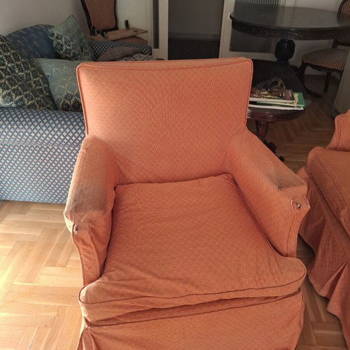 Vintage three-seater sofa and two antique armchairs with dark wood frame