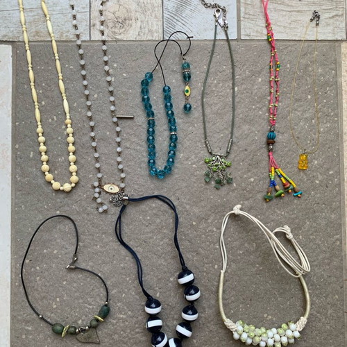 Set of 9 necklaces with various designs