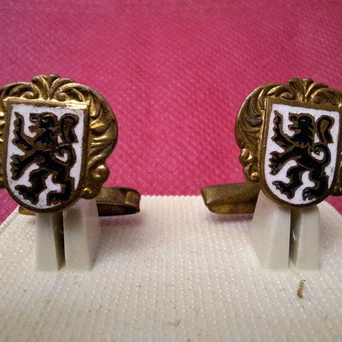 Vintage cufflinks used with black heraldic lion and gold metal