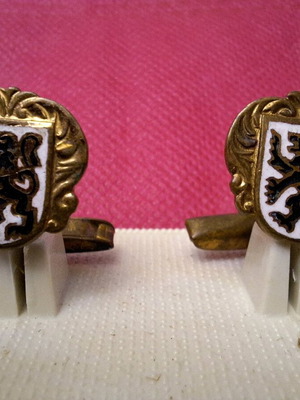 Vintage cufflinks used with black heraldic lion and gold metal