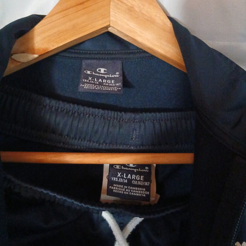 Champion tracksuit like new with small almost invisible knee defect