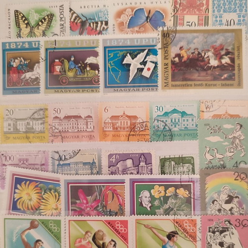 Stamp collection like new, 500+ worldwide in album