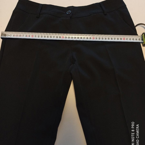 Low-rise pants in very good condition, size Large