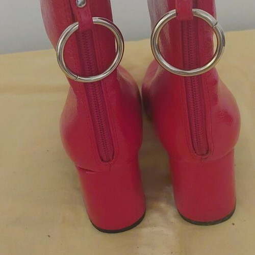Red ankle boots like new, size 39, striking design