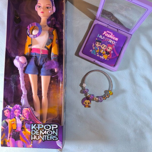 Rumi musical doll from K-Pop Demon Hunters with bracelet