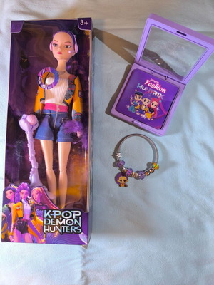 Rumi musical doll from K-Pop Demon Hunters with bracelet