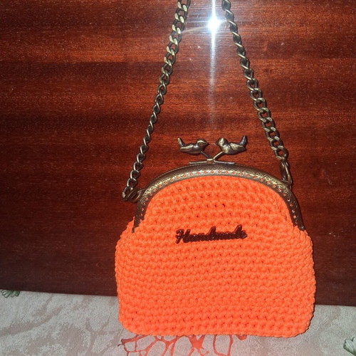 Knitted handbag new, orange color