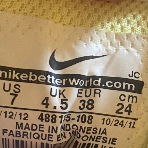 Nike athletic shoes used, white yellow, size 38