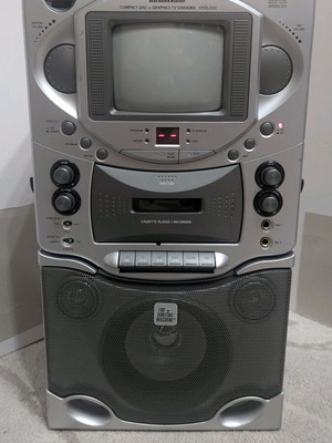 Karaoke machine The Singing Machine like new with CD and cassette player