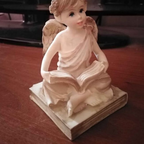 Angel figurine beige color like new
