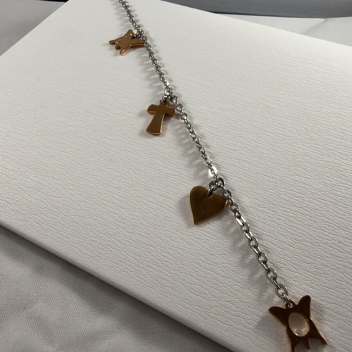 Rebecca bracelet stainless steel like new, gold and silver with designs