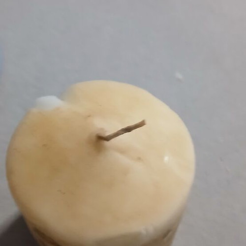Set of 2 decorative candles with minor dents