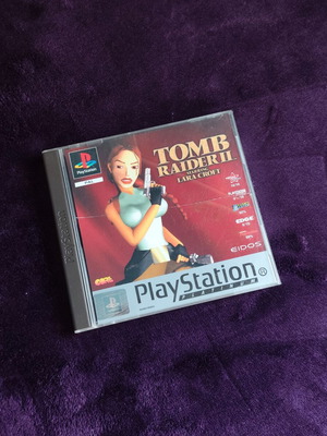 Tomb Raider II PS1 Platinum Edition παιχνίδι μεταχειρισμένο, θήκη με σπασίματα