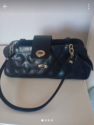 Women's black handbag with silver details, like new