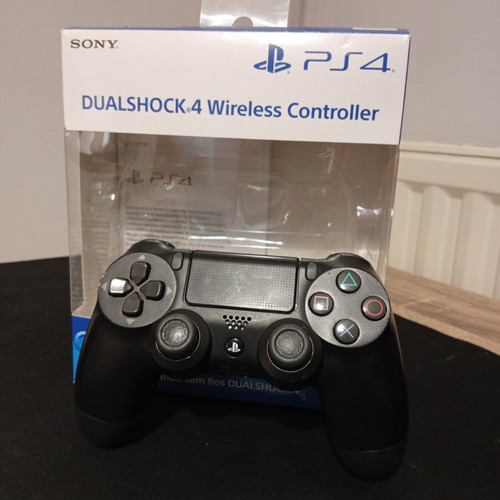 Sony DualShock 4 PS4 Jet Black wireless controller with box and manual