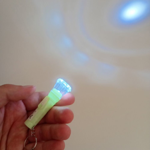 Keychain flashlight used, functional