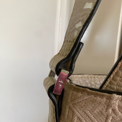 Calvin Klein crossbody bag used, beige with embossed logo