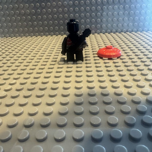 Lego Minifigure Ninjago Stone Army Scout like new, yellow face, black quiver