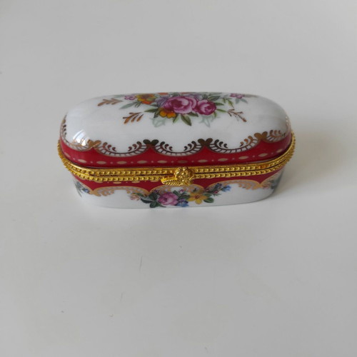 Limoges porcelain trinket box like new with floral design