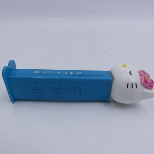 Hello Kitty Pez Dispenser used, Yoga Pez Namaste pink flower