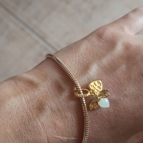 Charm firefly that glows in the dark, new, copper with silver plating