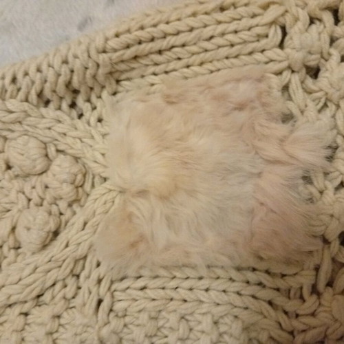 Knitted beige vest with hood and fur like new
