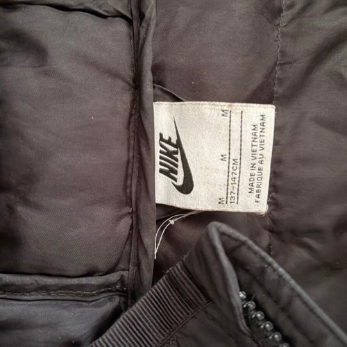 Nike Sportswear kids' puffer jacket, black with pink logo