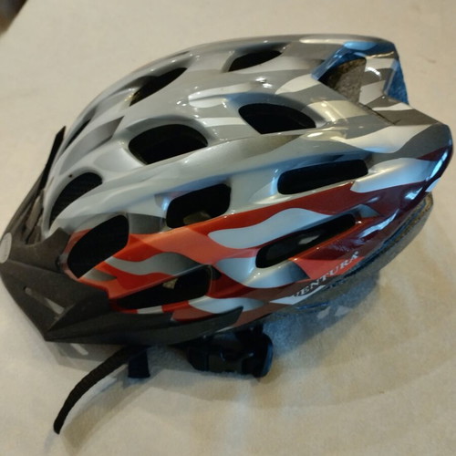 Bicycle helmet used, teen size 54-58 cm with left side wear