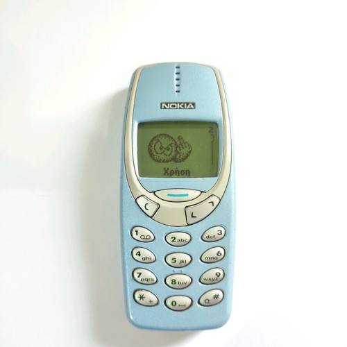 Nokia 3310 Classic Phone Turquoise used with brick buttons and charger
