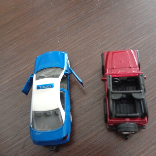 Siku toy cars used, set of 2 including taxi and Jeep Wrangler