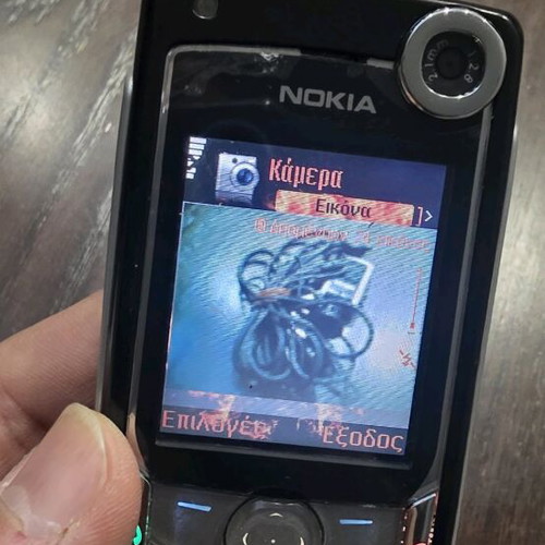 Nokia 6680 like new with original headphones without battery