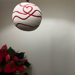 Christmas ceramic ball new with red thread