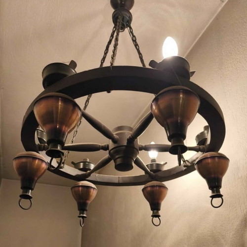 Antique wheel chandelier, wood and copper tones