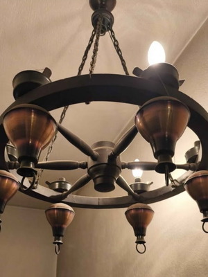Antique wheel chandelier, wood and copper tones