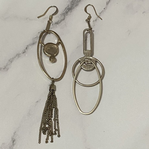Long earrings used, black and silver color