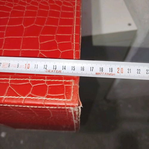 Shelf with red leather upholstery used, 5 compartments for CDs