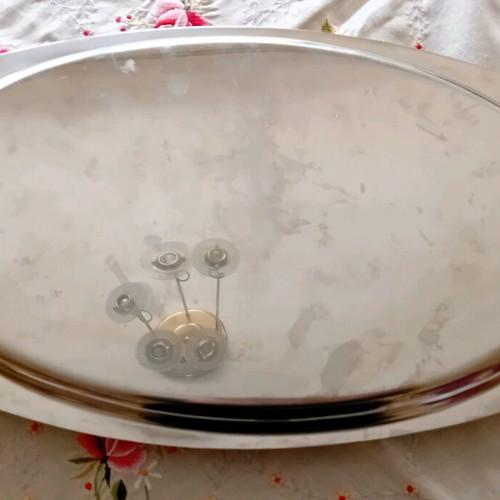 Serving platter like new with woven design, stainless steel 18/10