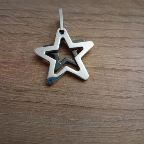 Star pendant made of steel like new, silver and black