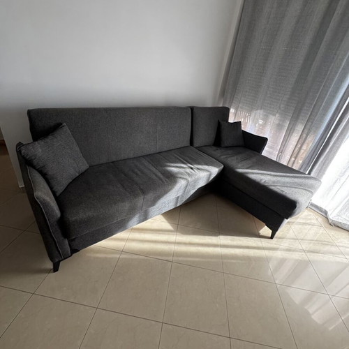 Corner sofa bed gray with storage, used