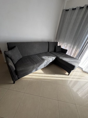 Corner sofa bed gray with storage, used
