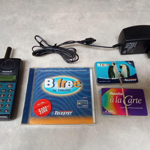Ericsson GA 628 mobile phone used, vintage collectible with charger and cards