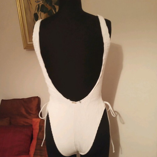 One-piece swimsuit used, white, size M with laces