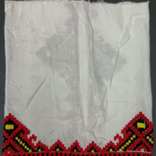 Collectible traditional fabric with embroidered pattern No 114 used