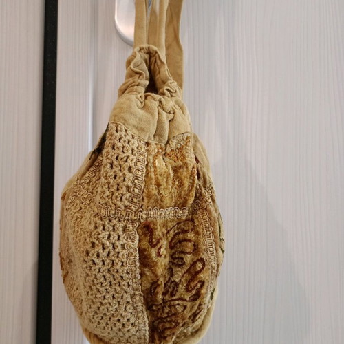 Mini fabric backpack used