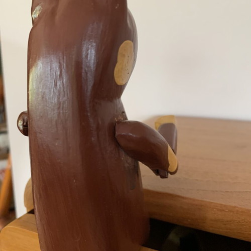 Wooden sitting cat with movable arms, like new, ~20 cm