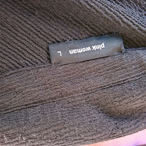 Pink Woman black shirt size L