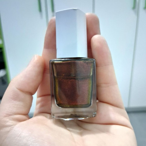 Brown shiny nail polish used